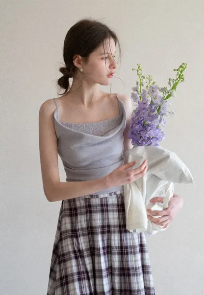 Silk-like tank top with thin straps and draped neckline