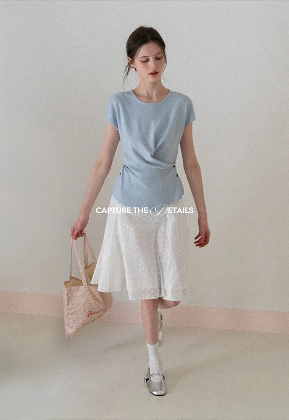 Flared pleated skirt with subtle texture