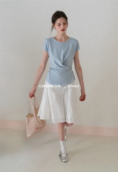 Flared pleated skirt with subtle texture