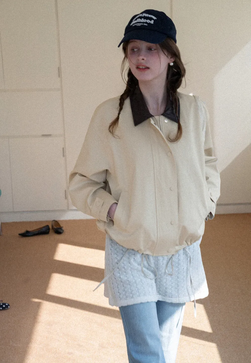 Short jacket with contrast collar and front buttons