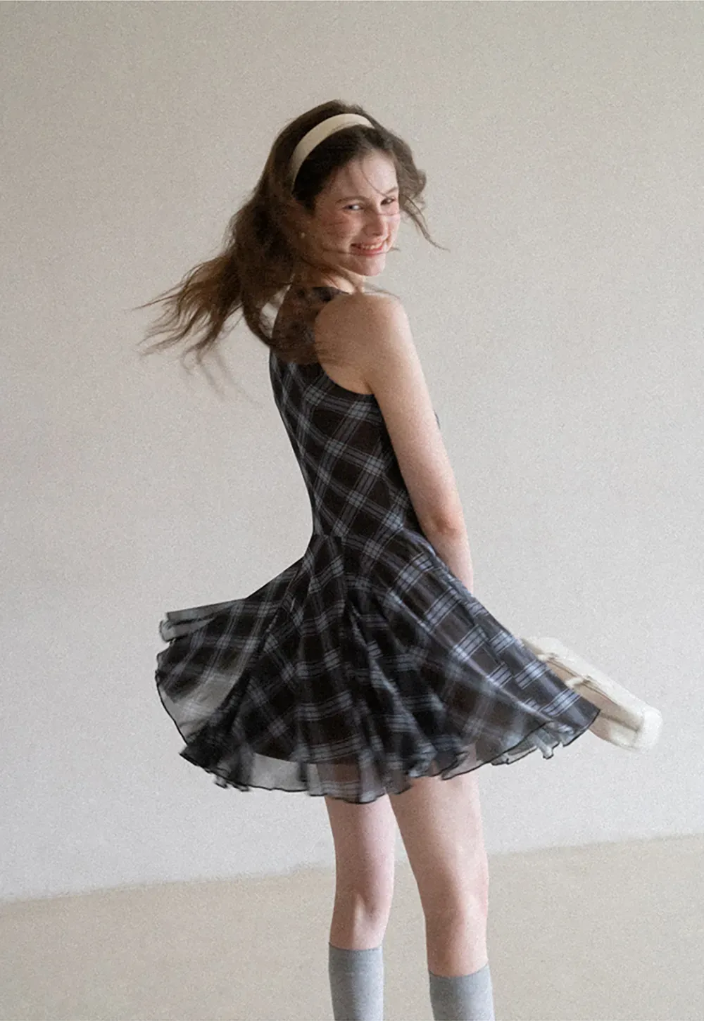 Plaid sleeveless dress with flared skirt