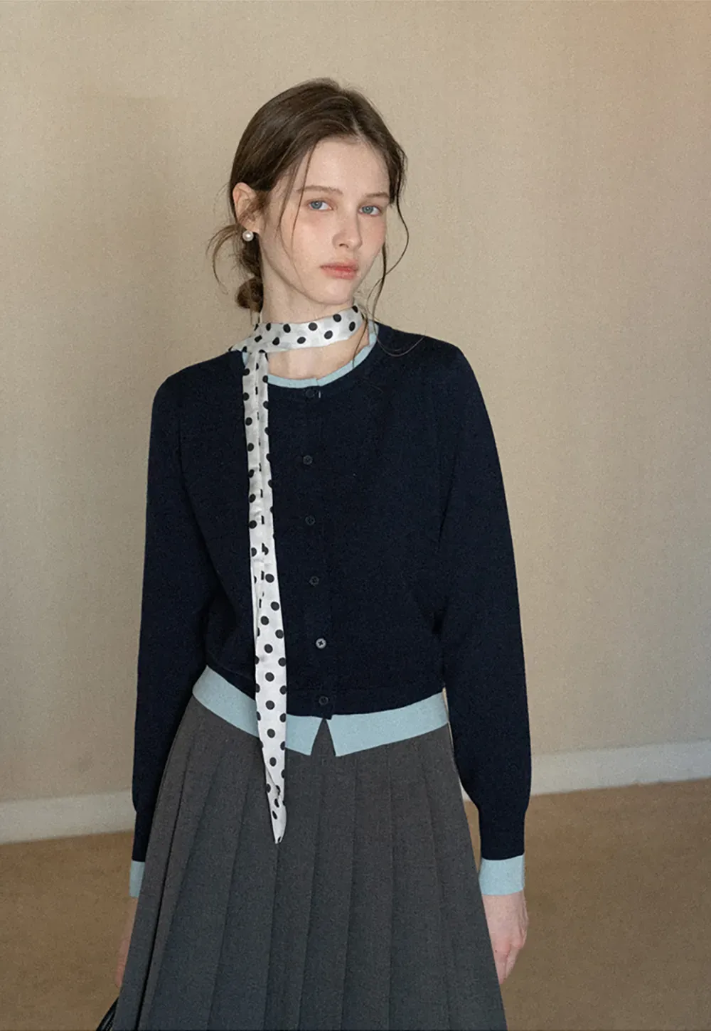 Elegant Round Neck Knit Sweater with Button Detail