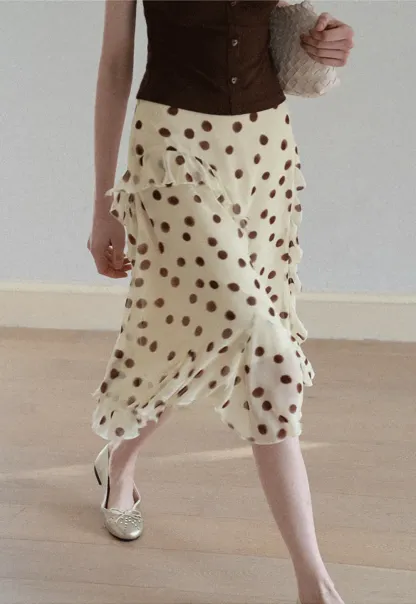 Polka dot ruffled asymmetrical midi skirt