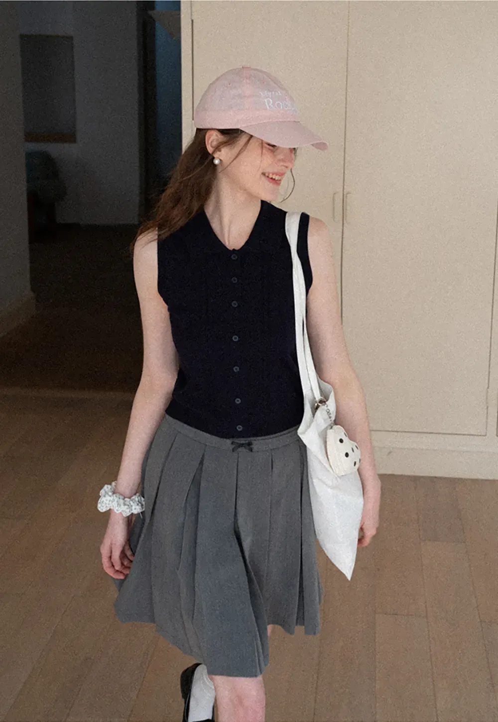 Pleated skirt with front bow detail