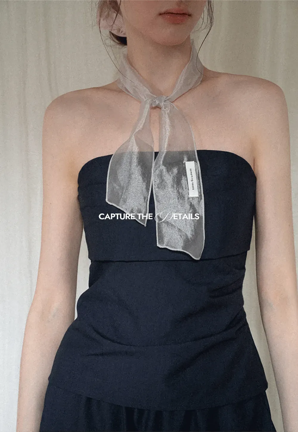 Strapless top with sheer neck tie and loose fit pants