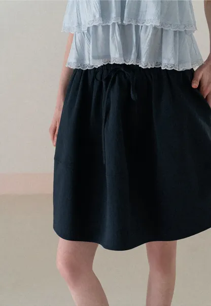 A-line skirt with drawstring waist and layered hem