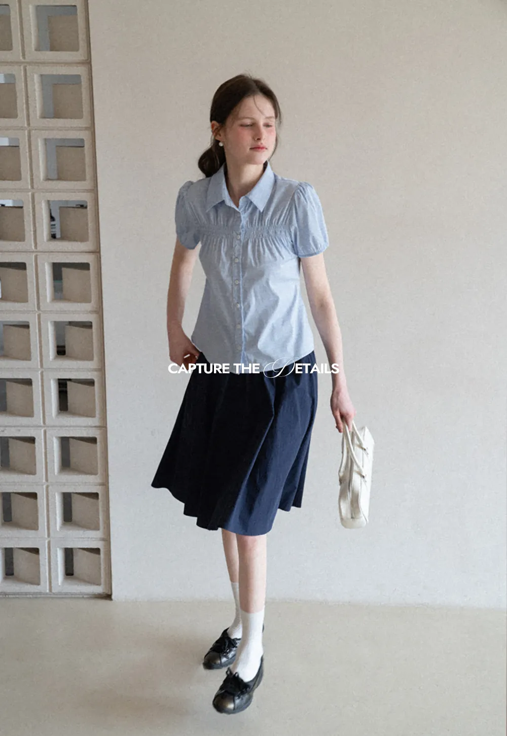 A-line pleated midi skirt with waistband