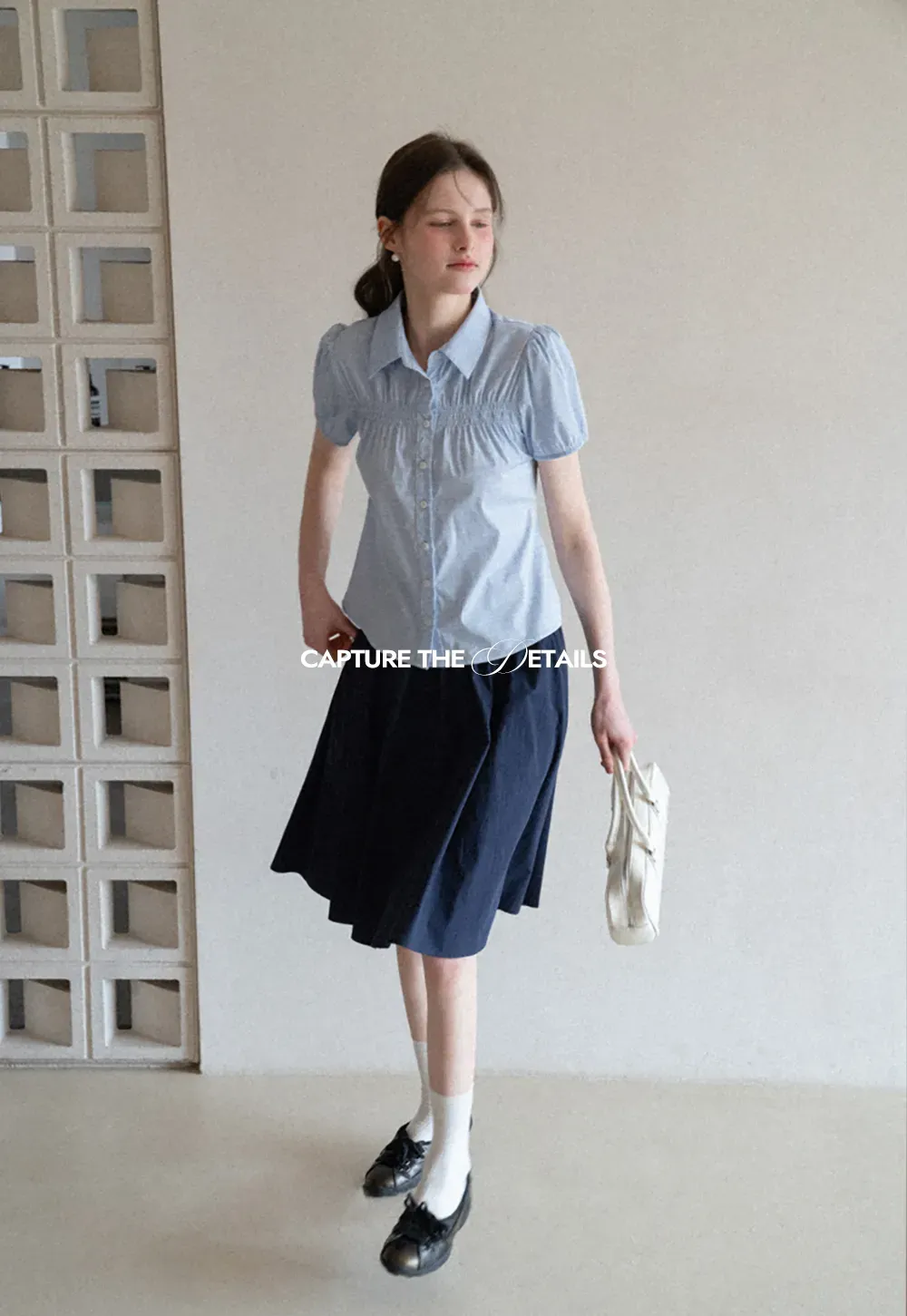 A-line pleated midi skirt with waistband