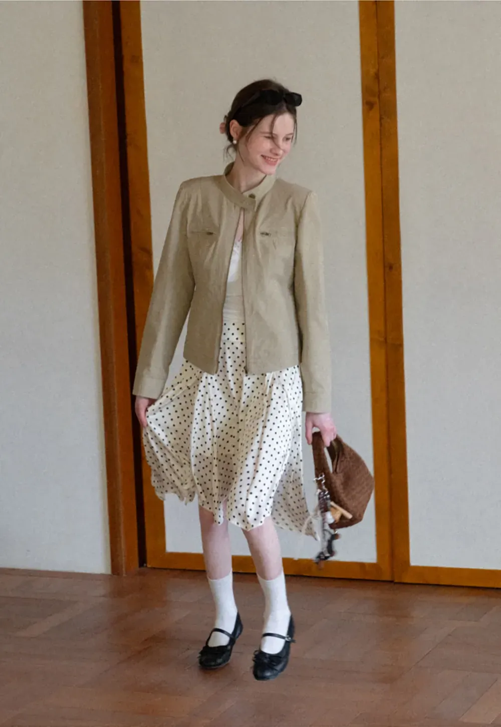 Polka dot asymmetrical hem skirt with pleats