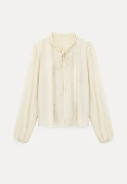 Shirt with ruffled collar and tie front layered skirt