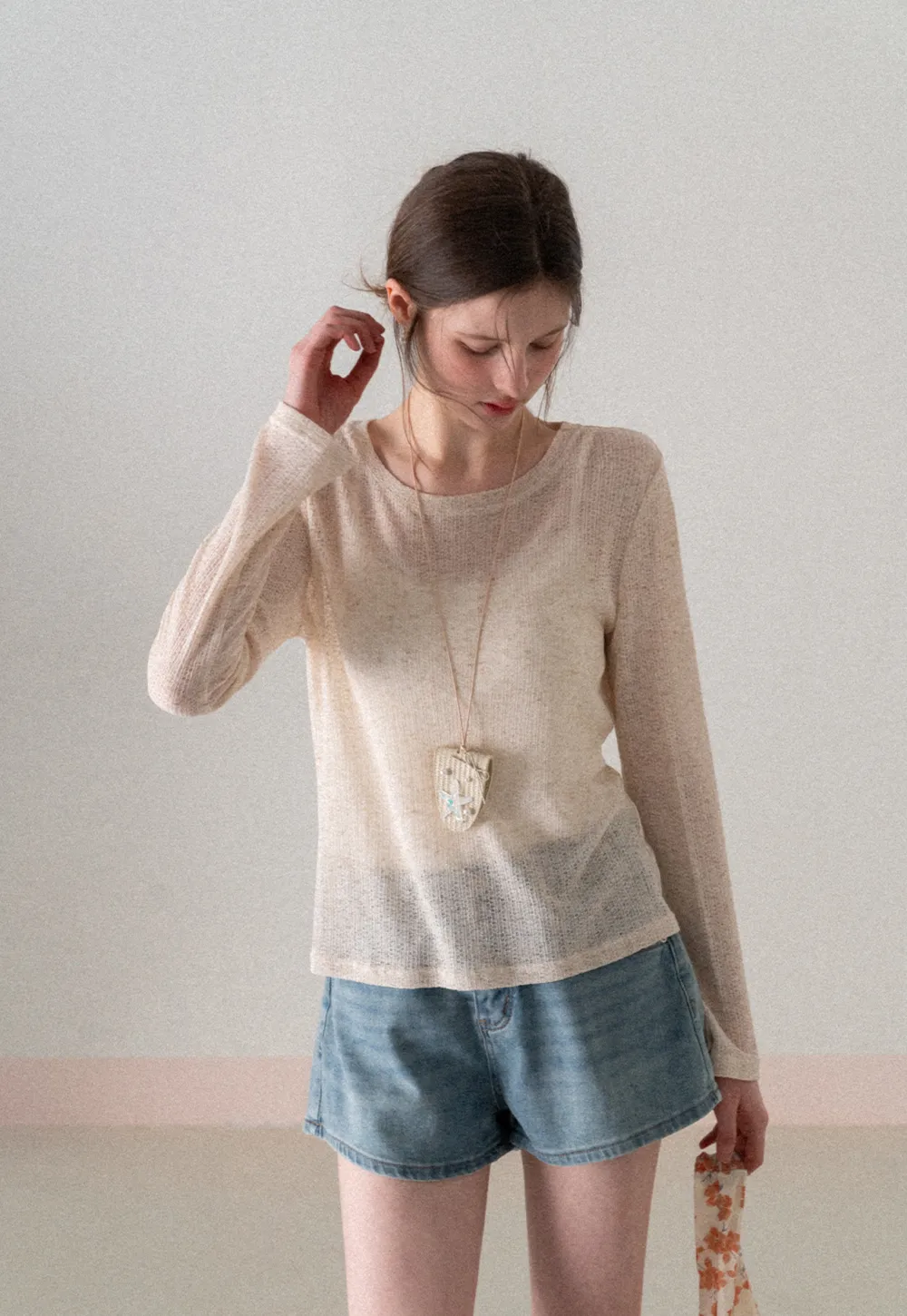 Long sleeve sheer knit top with round neckline