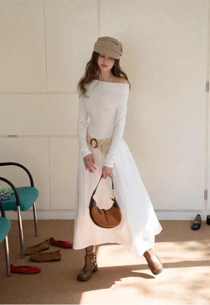 Elegant asymmetrical long sleeve dress with unique belt design