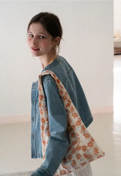 Denim short jacket with button front and chest pockets