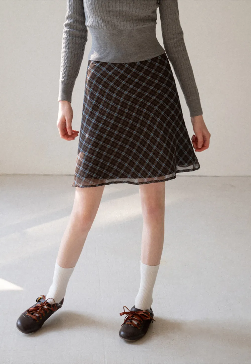 Plaid Skirt with Flowy Hem Design