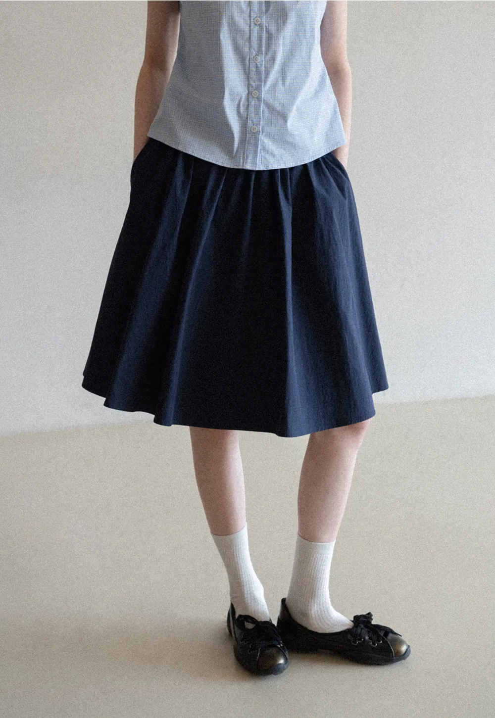 A-line pleated midi skirt with waistband