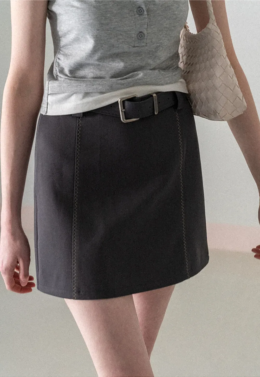 A-line mini skirt with contrast stitching and belt