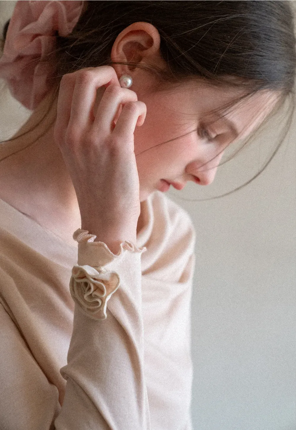 Long sleeve top with ruffled hem and cuffs