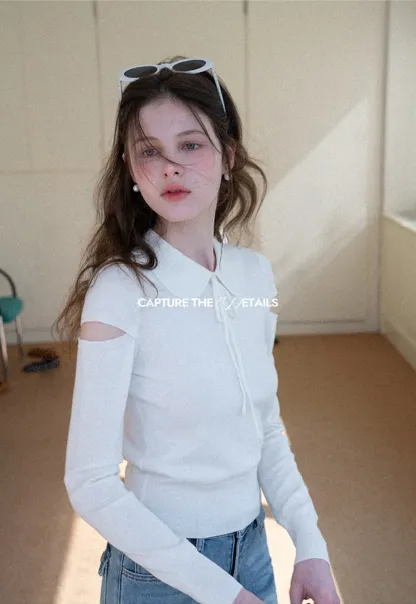 Elegant Knit Sweater with Bow Detail and Cutout Sleeves