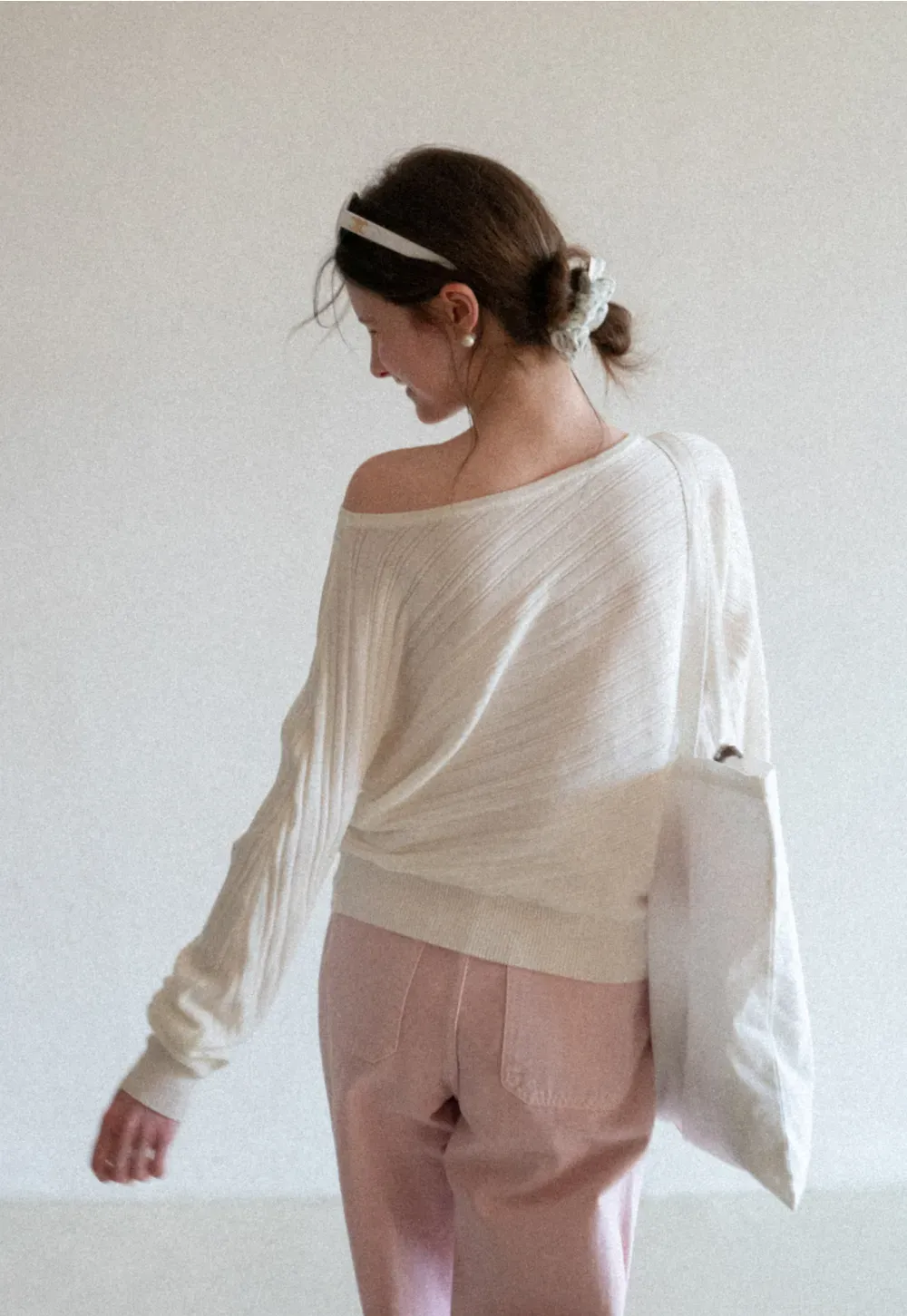 Ribbed knit sweater with wide neckline and long sleeves