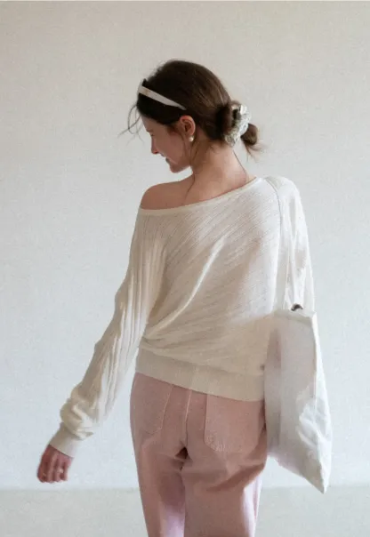 Ribbed knit sweater with wide neckline and long sleeves