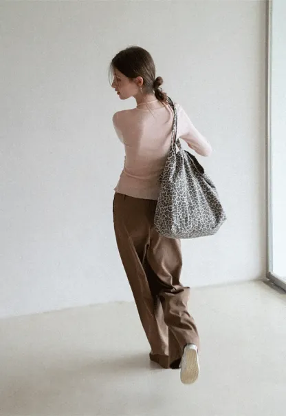 Long sleeve wrap knit sweater with ruched detail