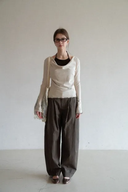 Beige Long-Sleeve Top with Ruffled Hem and Bow Tie Back