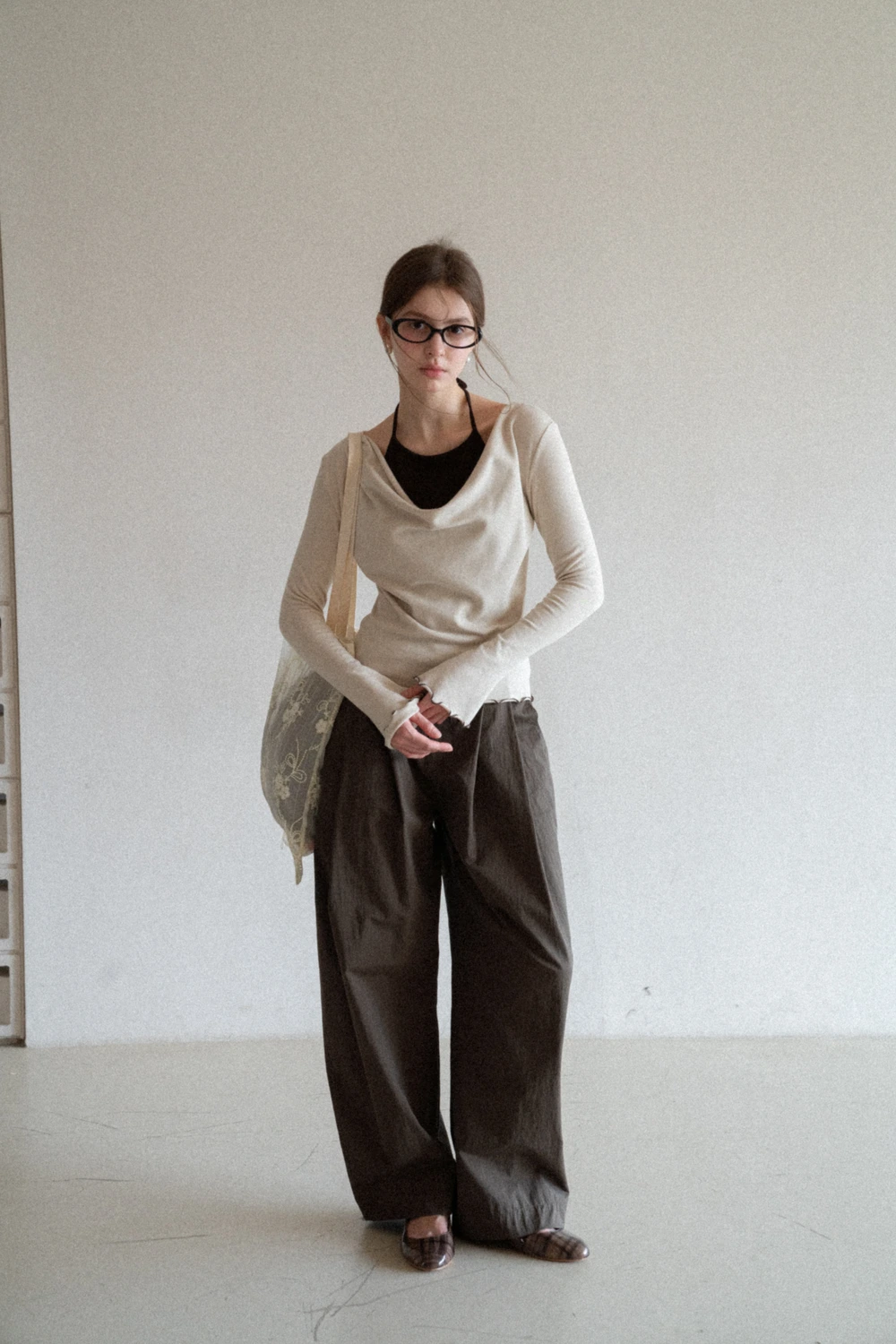 Beige Long-Sleeve Top with Ruffled Hem and Bow Tie Back