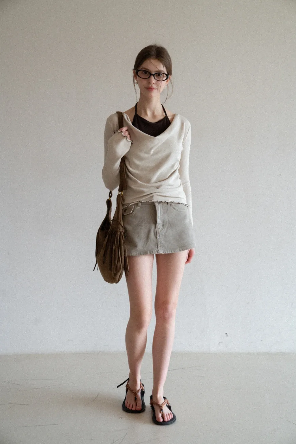 Beige Long-Sleeve Top with Ruffled Hem and Bow Tie Back