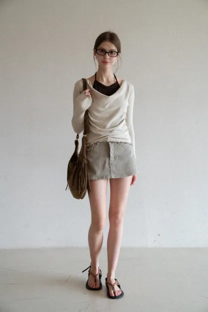 Beige Long-Sleeve Top with Ruffled Hem and Bow Tie Back