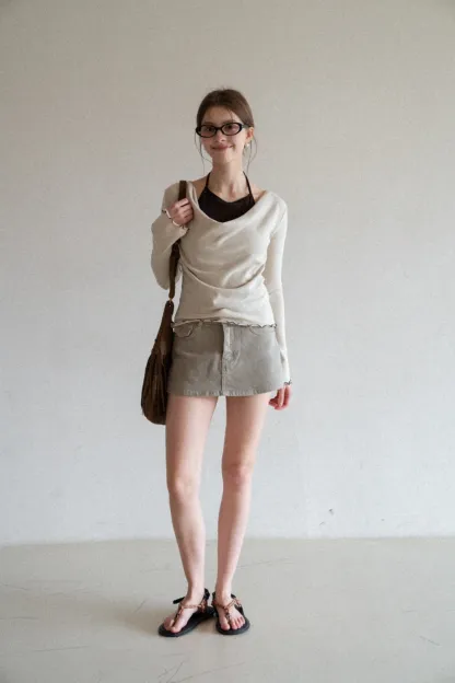 Beige Long-Sleeve Top with Ruffled Hem and Bow Tie Back