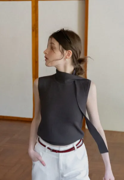 Sleeveless high neck knit top with side tie detail
