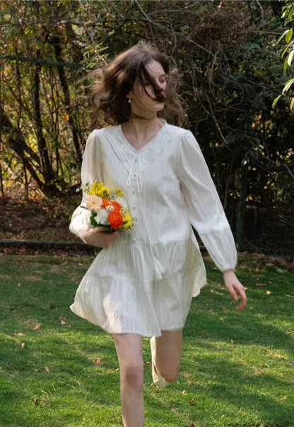 V neck long sleeve tiered dress with lace trim