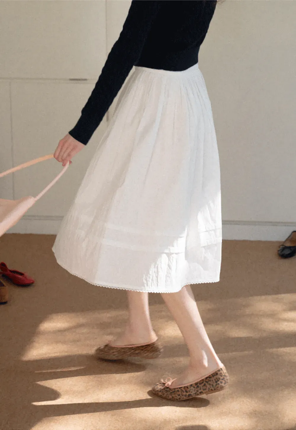 Lightweight pleated midi skirt with elastic waist