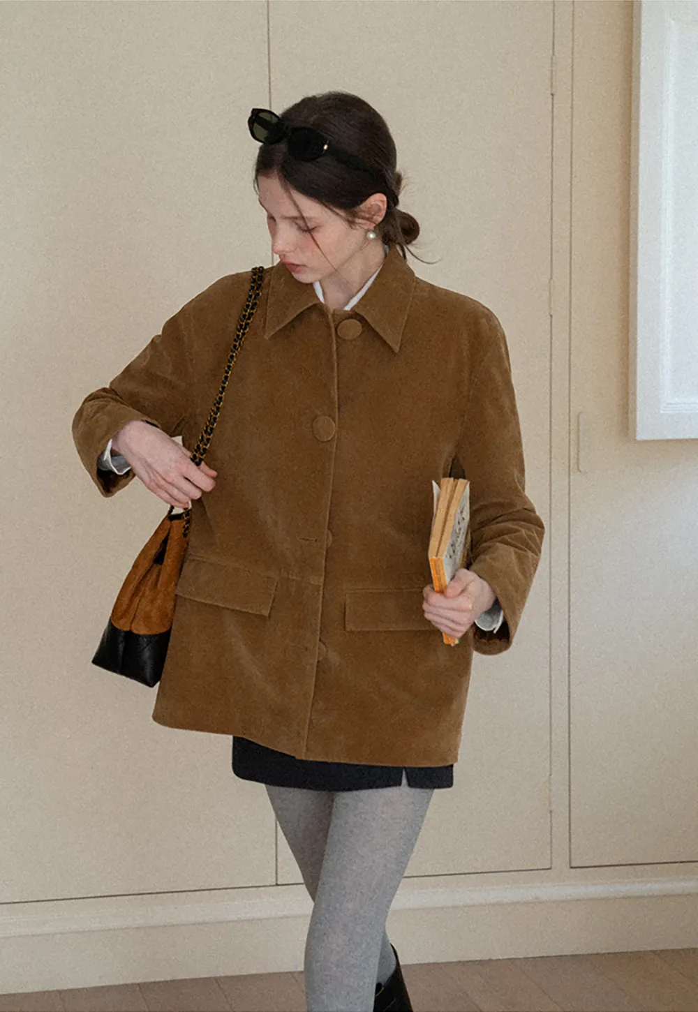 A-line mini skirt with textured fabric and central seam design