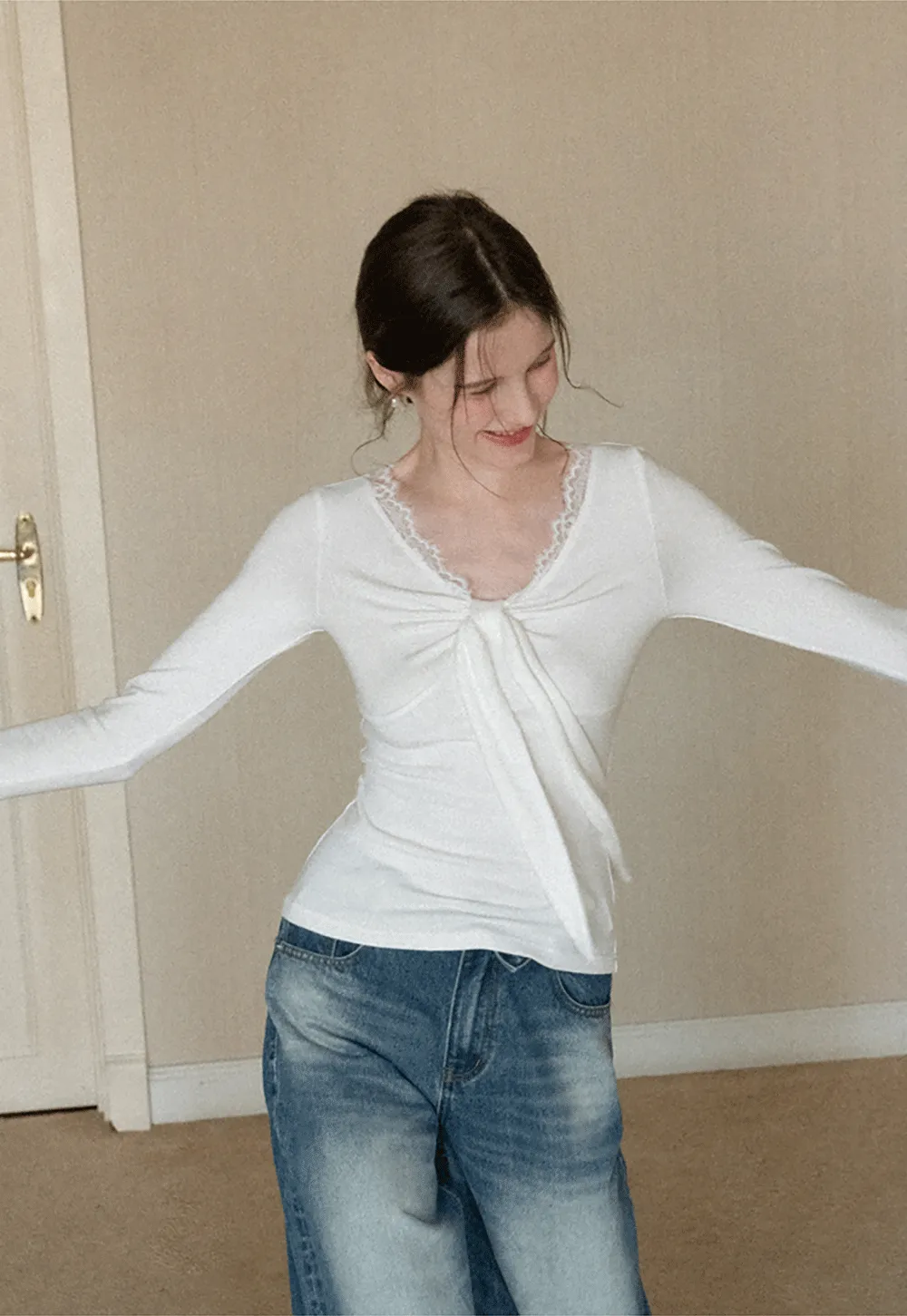 Elegant V Neck Long Sleeve Top with Bow Detail