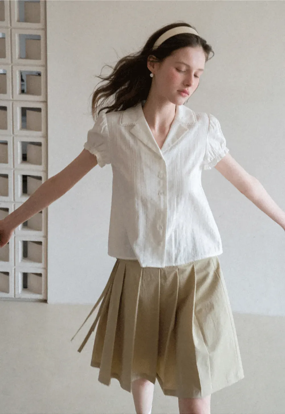Pleated skirt with side tie waistband
