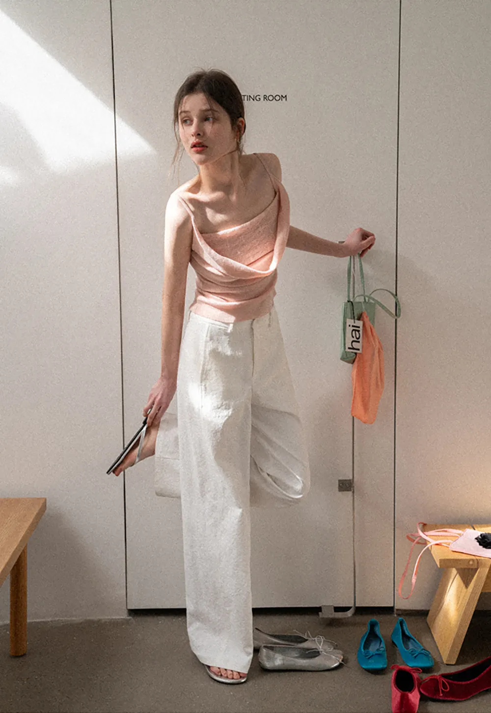 Silk-like tank top with thin straps and draped neckline