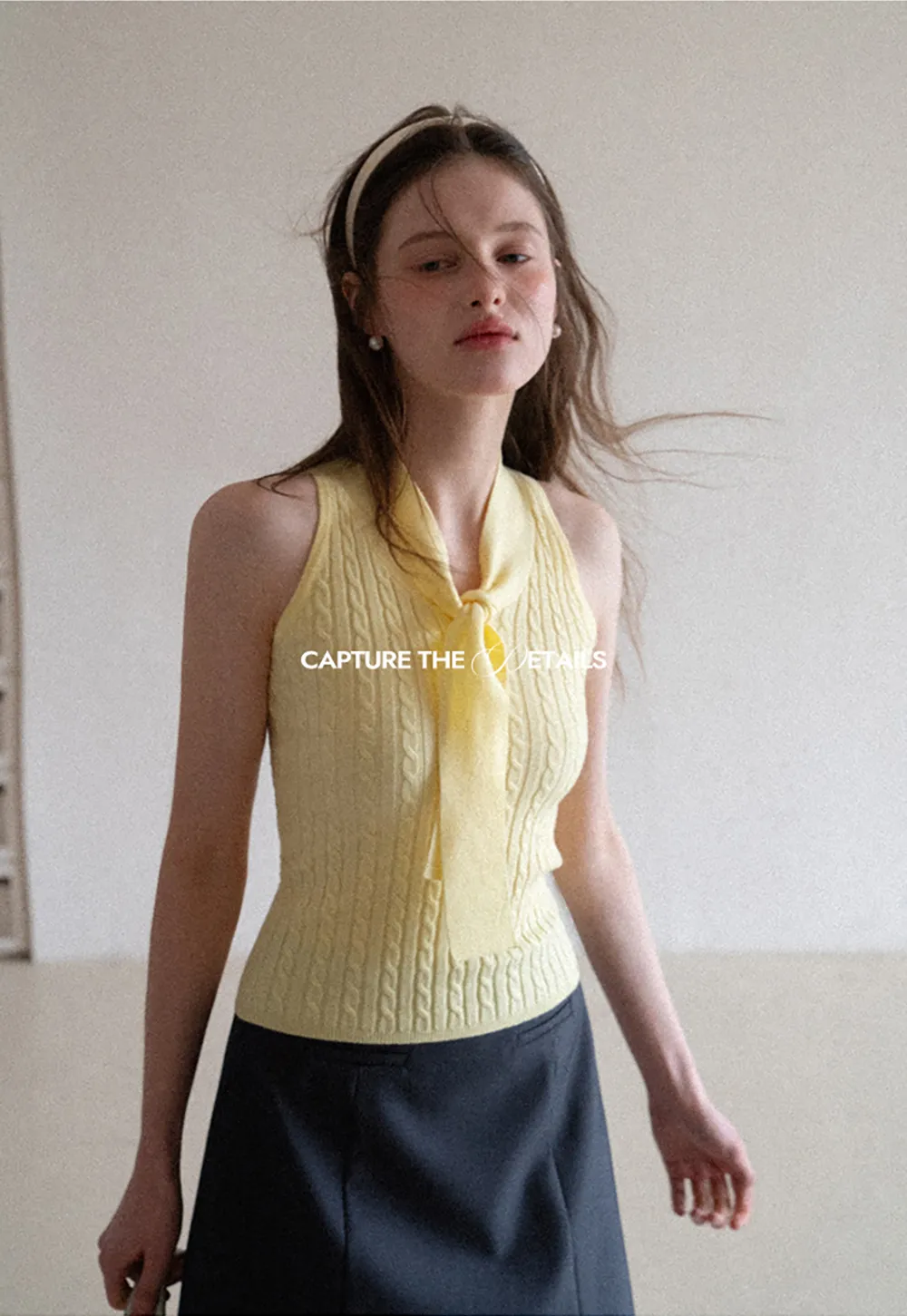 Knit Sleeveless Top with Front Bow Detail