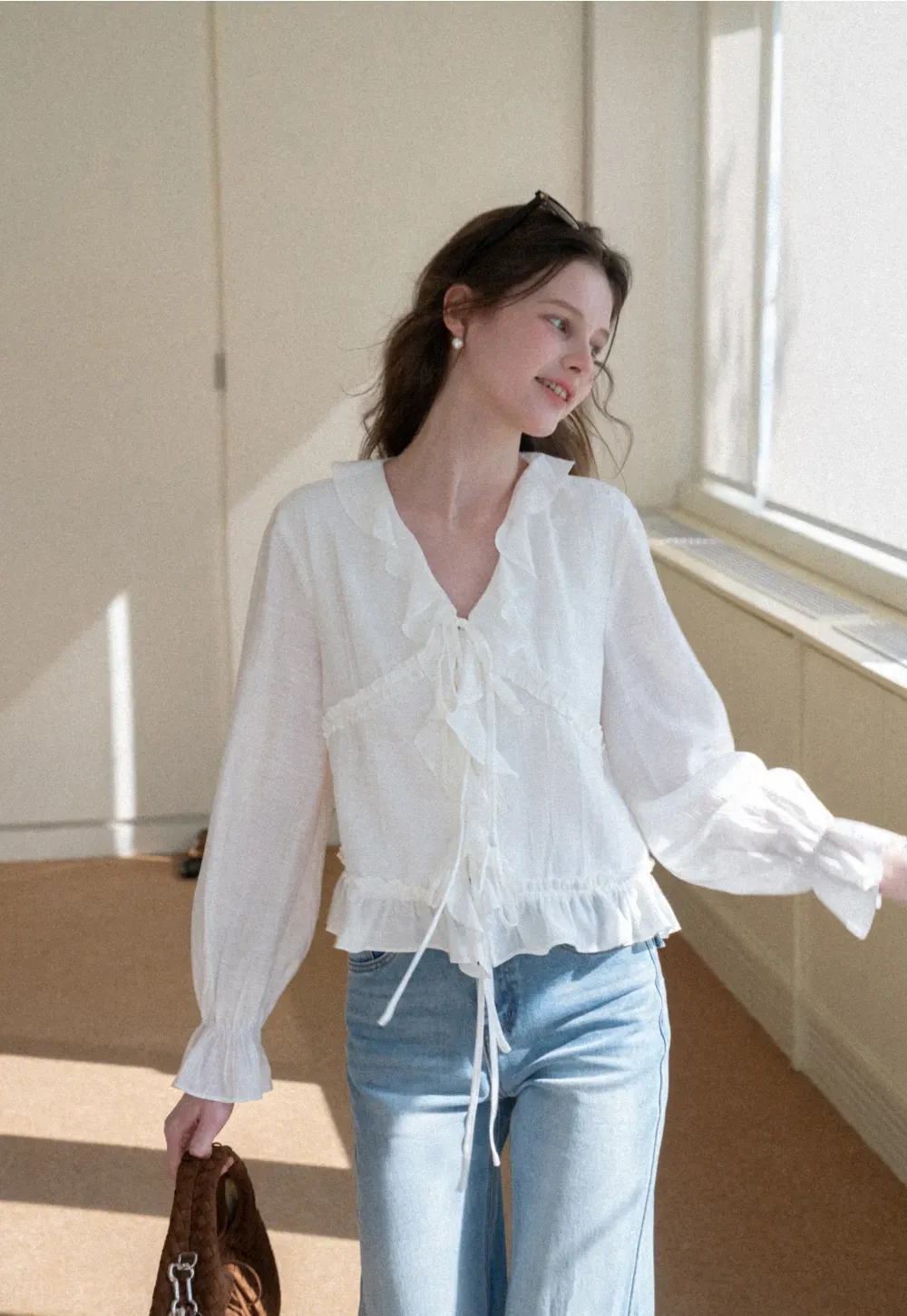 Elegant Blouse with Ruffle Detail and Tie Front Design