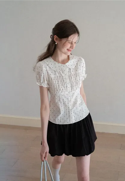 Polka dot shirt with ruffled sleeves and Peter Pan collar