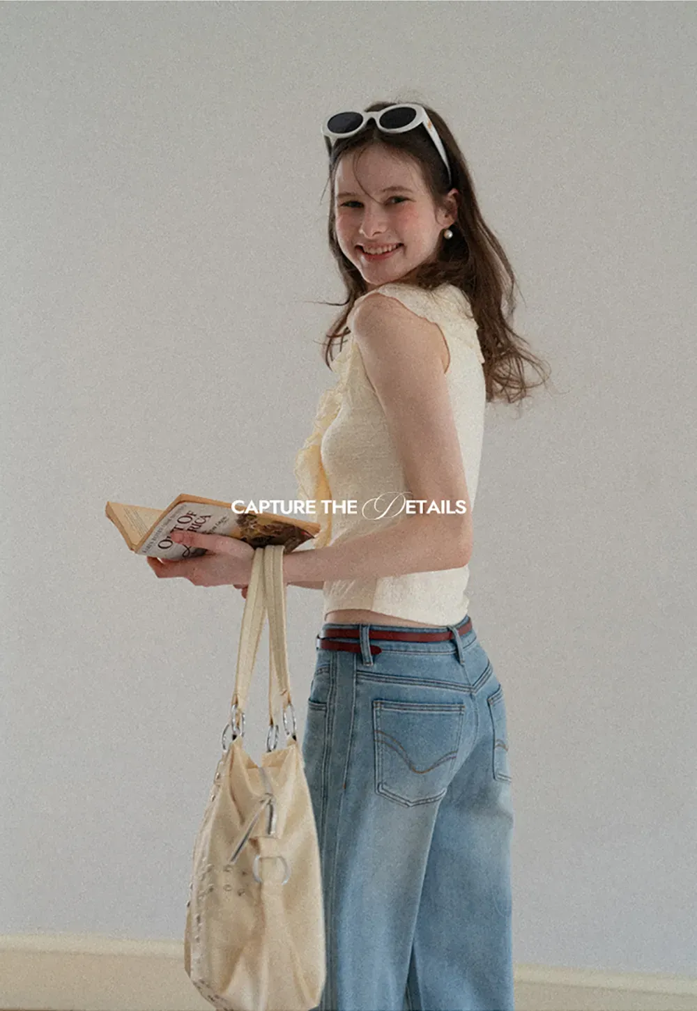 Sleeveless Top with Ruffled V Neck and Floral Detail