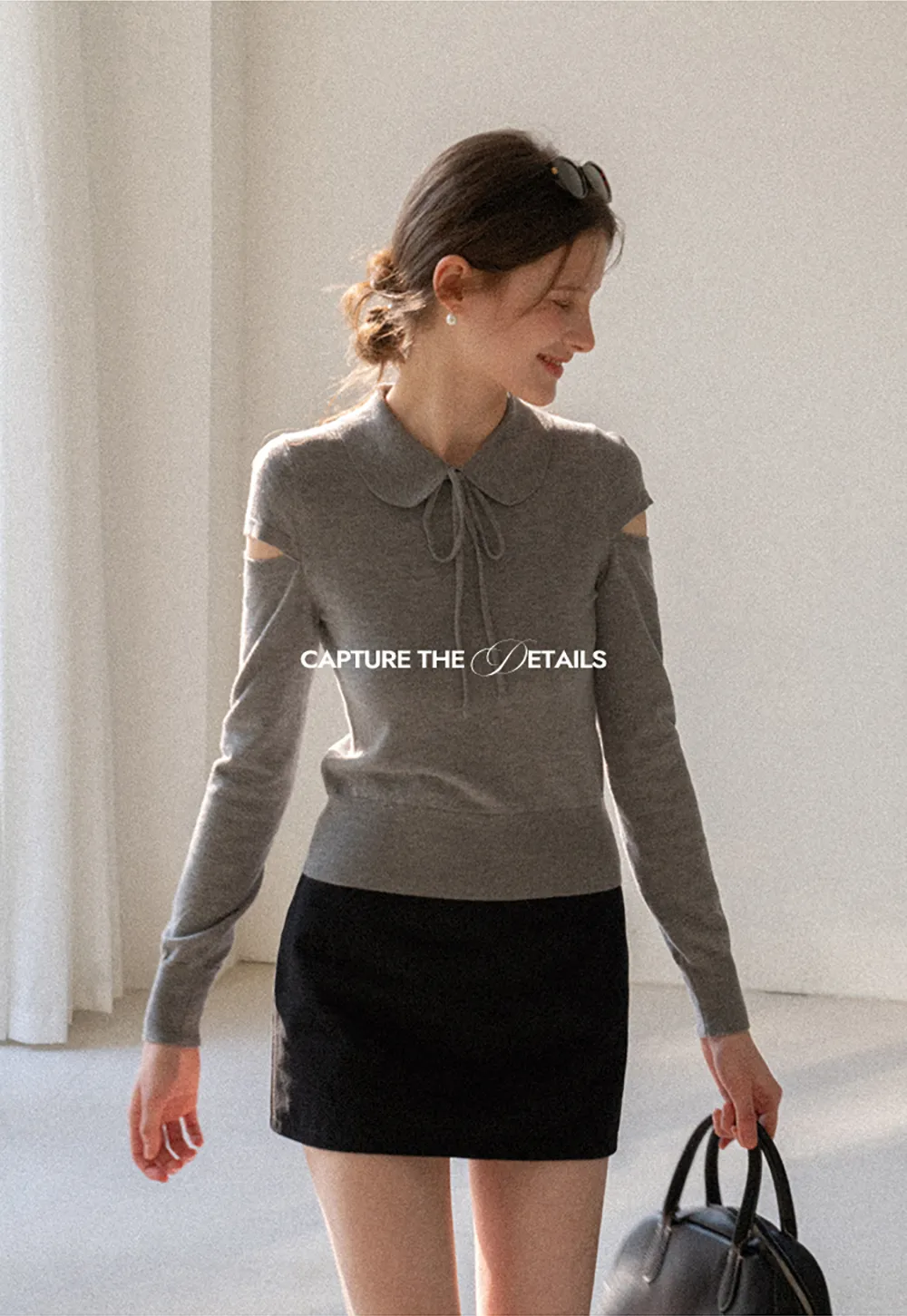 Elegant Knit Sweater with Bow Detail and Cutout Sleeves