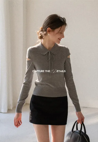 Elegant Knit Sweater with Bow Detail and Cutout Sleeves