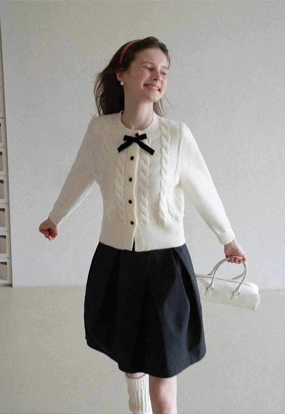 Elegant Cable Knit Cardigan with Bow Detail