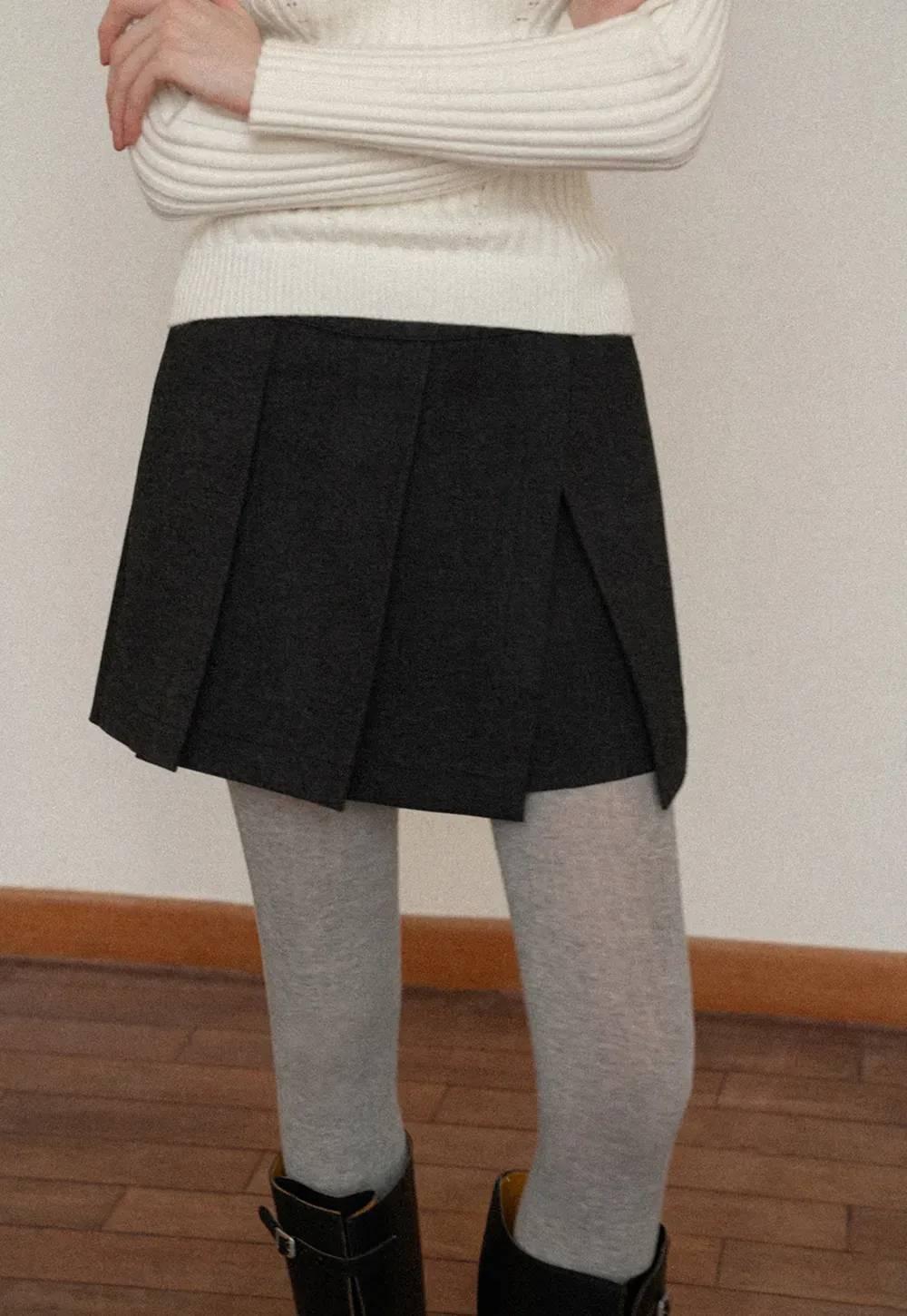 Elegant Pleated Mini Skirt with Tights and Boots Combo
