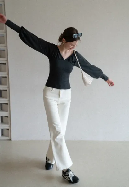 V neck long sleeve top with ruched detail