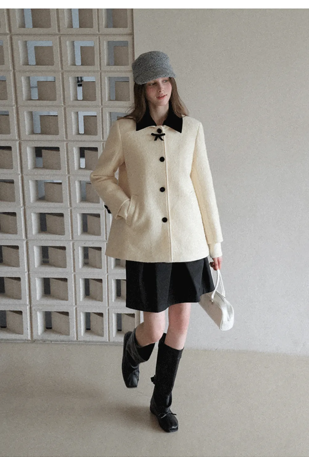 Elegant Wool Coat with Bow Detail and Contrasting Collar