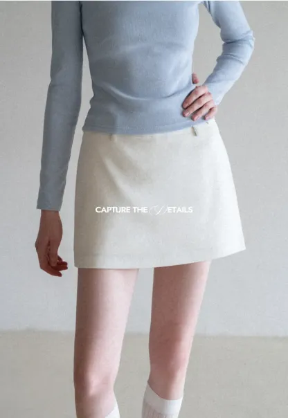 Elegant Pleated Mini Skirt with Asymmetrical Hem