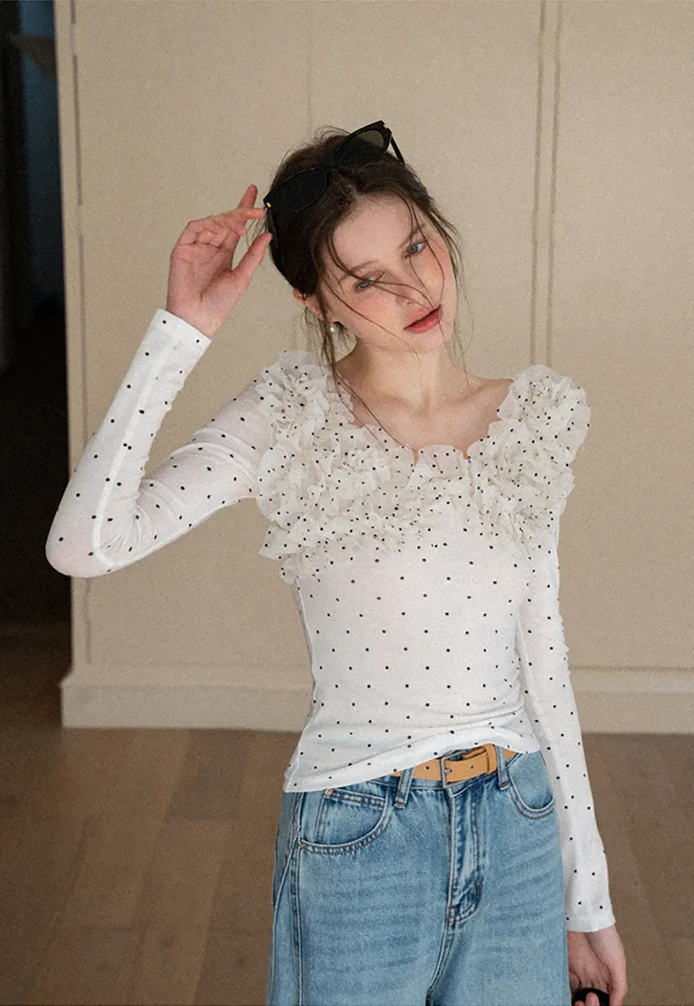Polka dot long sleeve top with ruffled neckline