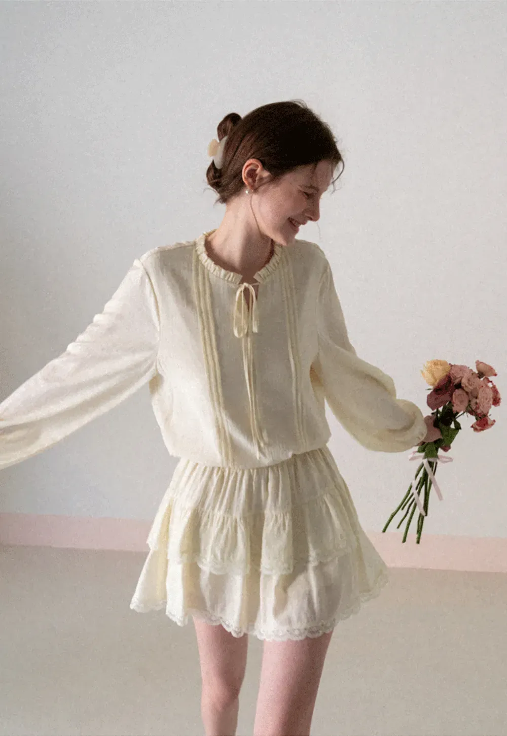 Shirt with ruffled collar and tie front layered skirt